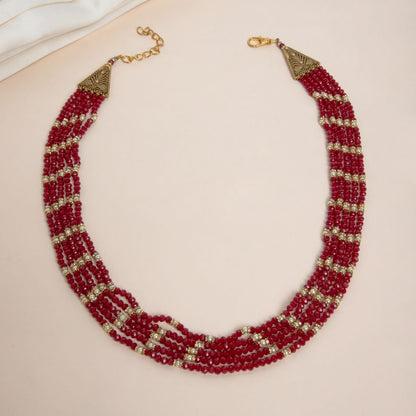 Multi-Strand Beaded Necklace with Golden Accents
